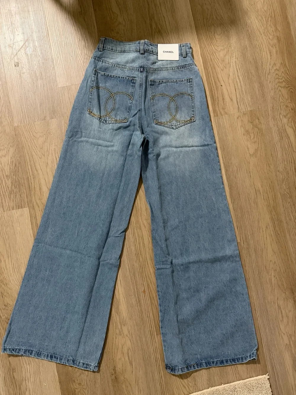 CHANEL Light Wash Wide-Leg Flared Jeans